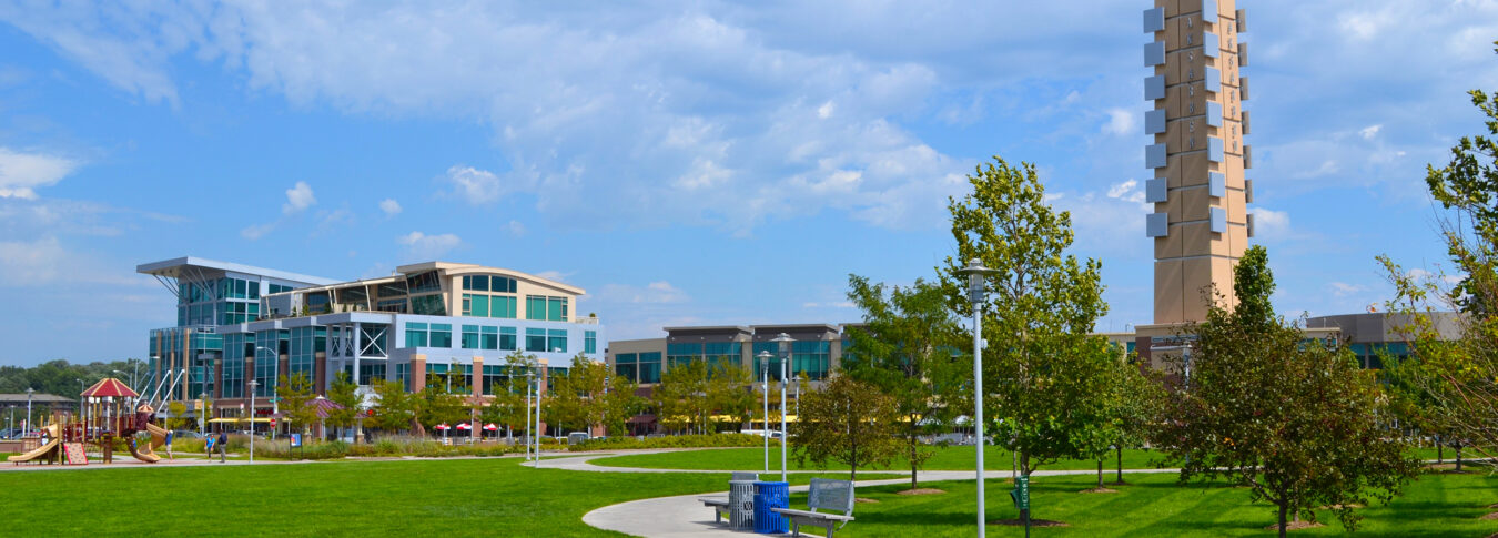 Situated in the heart of Omaha, Aksarben Village is a mixed-use redevelopment, incorporating the principles of new urbanism. Residential, office, retail, entertainment, and recreation all converge to make this project a positive addition to the Omaha metropolitan community. Lamp Rynearson was a key consultant to the owner in the development of Aksarben Village. Our responsibilities included infrastructure feasibility studies, platting, demolition and site grading, design and construction administration for storm sewers, and paving and utility coordination. Lamp Rynearson delivered on large and complex tasks including hydrologic/hydraulic analysis of the Papillion Creek, and the design of the trunk sewers and outlet structures.