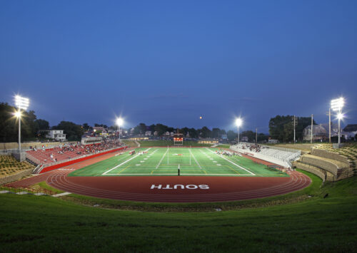 Omaha South High School had not hosted a varsity football game since 1946. Collin Field, known as “The Hole”, sat in a natural bowl at 23rd and “L” Streets and was used as South High’s track and practice football field. Lamp Rynearson provided engineering design services for a new multi-sport playing field and track stadium to replace the existing one. Goal: Design a full-sized soccer field meeting the requirements of the annual Nebraska State High School Soccer Tournament that could also be used as a varsity football field. The completed facility has had a major impact on Omaha South High School, located in a neighborhood rich in Hispanic culture, while at the same time providing meaningful social, economic and sustainable design benefits.